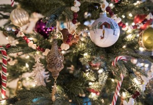 Hand-crafted one-of-a-kind are the homeownersÕ preference when decorating the tree. ÒJust about every ornament has a story and I remember exactly when and why I acquired each one. Putting up the tree is like arranging my memories,Ó says Mary Lou Couch.   STAFF PHOTO / NICK ADAMS