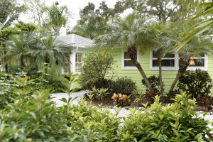 John and Debbie Dart's vintage Florida cottage in Laurel Park nestles into mature landscaping in an old urban Sarasota neighborhood noted for its many restored cottages. The Limesicle green home in on the market for $1,050,000.