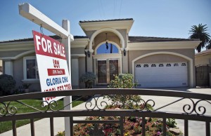 Should home buyers own the appraisals they pay for, or should lenders retain control?  (AP Photo/Nick Ut, File)
