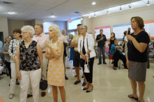 Preservationist Lorrie Muldowney, right, explains the history of midcentury modern school buildings in Sarasota County at the opening reception of Sarasota MOD Weekend, Oct. 9, 2014, at the History Center Museum, formerly known as the Chidsey Library, in Sarasota. Muldowney is a 2016 recipient of an Individual Distinguished Service Award from the Florida Trust for Historic Preservation. Staff photo / Harold Bubil; 10-9-2014.