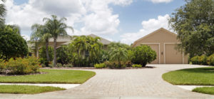 This house on 1 acre at 3828 Twin Rivers Trail is listed at $850,000 by Joe Murphy of Coldwell Banker. Built in 2005 as Johnson Homes' Captiva model, the 3,128-square-foot house has four bedrooms and three baths. But the main feature is the garage, which has bays for two RVs. Staff photo / Harold Bubil; 6-21-2016.